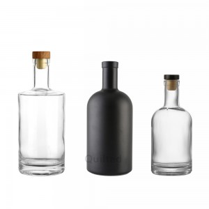 750 ml clear and black glass liquor bottle